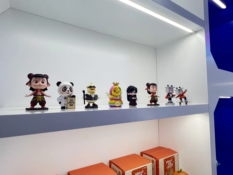 Custom character figures displayed as a varied branded collection
