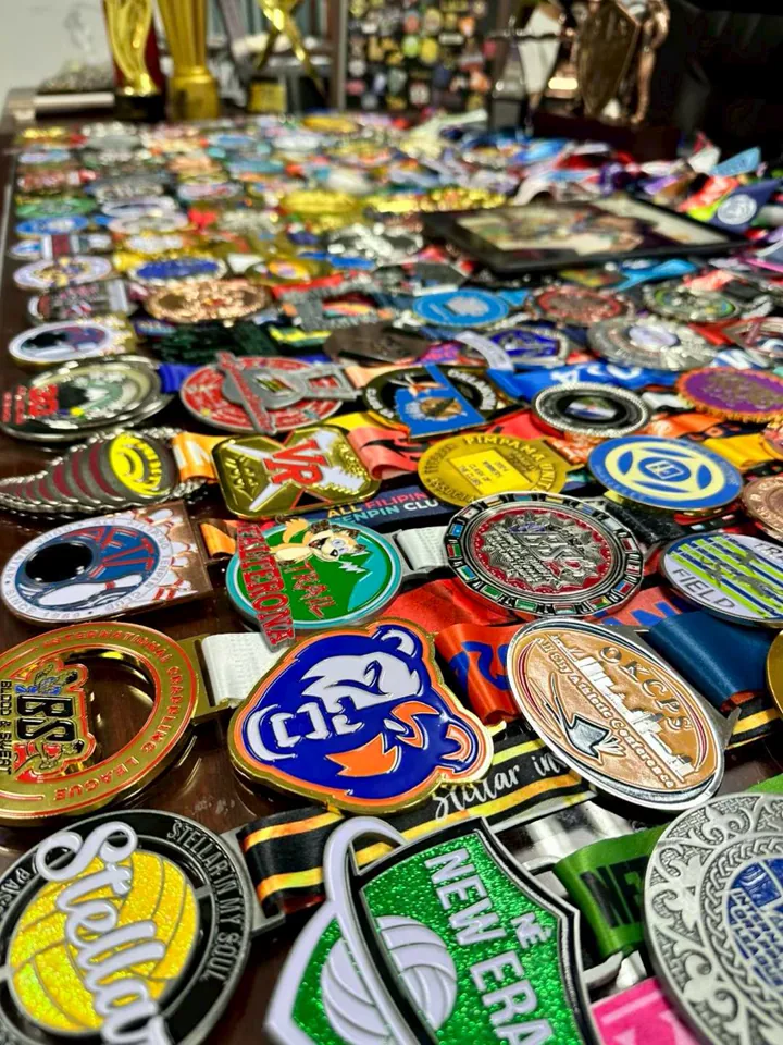 Custom metal medals and medallions in varied relief, plating, colors, and ribbons